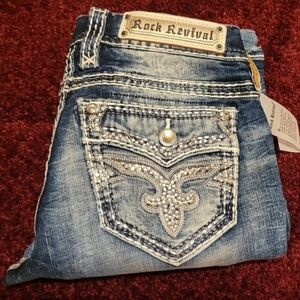 SZ 27/32 ROCK REVIVAL BOOT CUT JEANS NWT